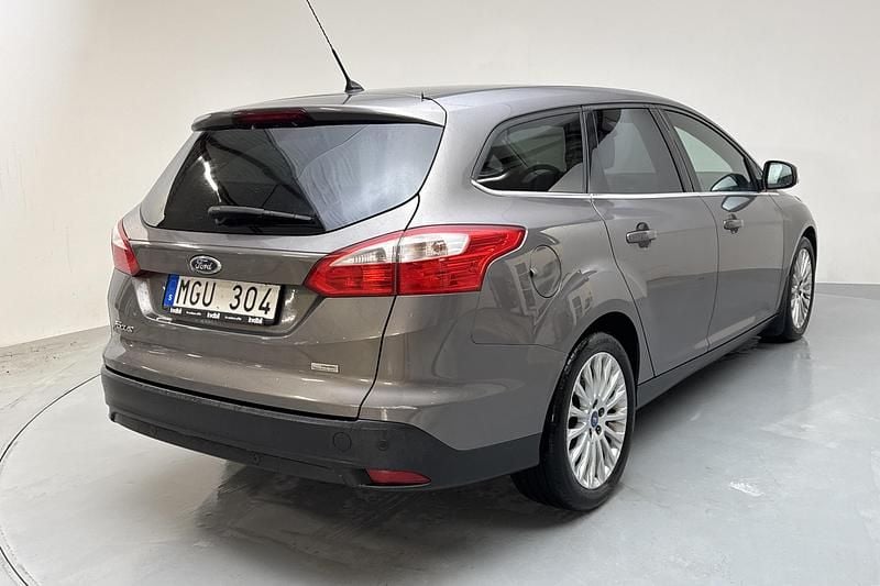 Begagnad Ford Focus Titanium 125 HK (91 kW) 2013 Brun Kombi