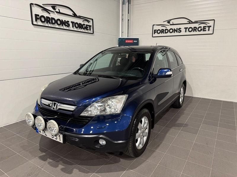Mörkblå (blå) Begagnad 2007 Honda CR-V SUV | 69 900 kr (Marknadspris) - Bild 1/4