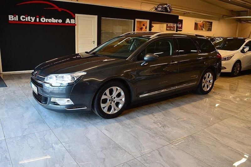 Grå Begagnad 2015 Citroën C5 Kombi | 79 900 kr (Marknadspris) - Bild 1/4