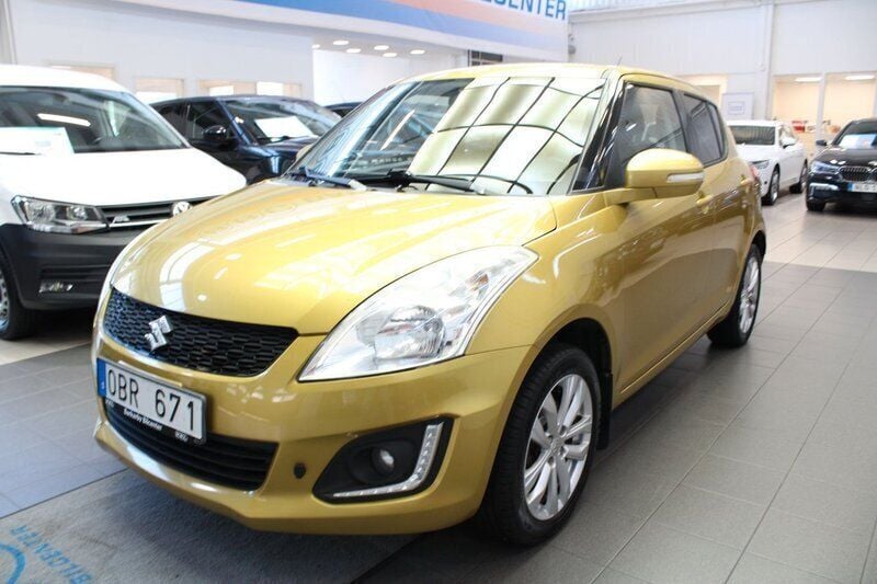 Gul Begagnad 2013 Suzuki Swift Exclusive Halvkombi | 59 900 kr (Bra pris) - Bild 1/4