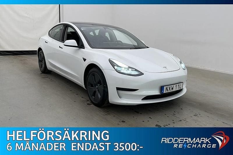 Vit Begagnad 2021 Tesla Model 3 Standard Range Plus Sedan | 249 700 kr (Marknadspris) - Bild 1/3