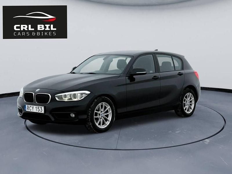 Svart Begagnad 2016 BMW 116 Advantage Halvkombi | 119 900 kr (Marknadspris) - Bild 1/4