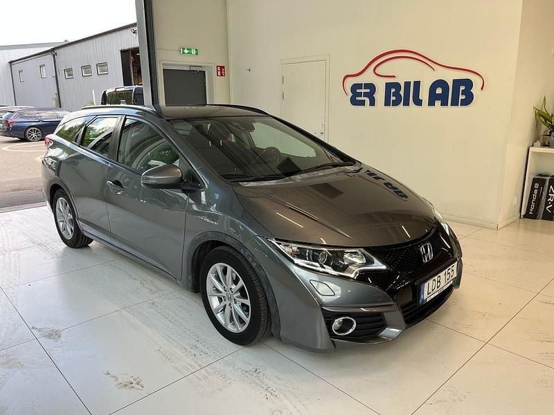 Mörkgrå (grå) Begagnad 2015 Honda Civic Elegance Kombi | 109 900 kr (Lite dyr) - Bild 1/4