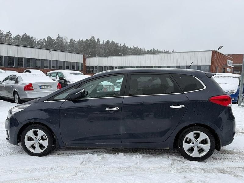 Begagnad Kia Carens 136 HK (100 kW) 2014 Blå Minibuss