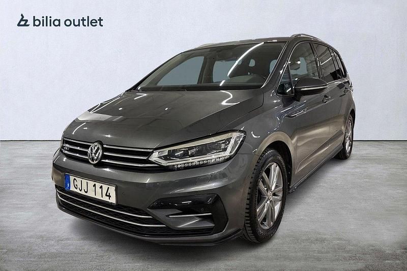Mörkgrå Begagnad 2018 VW Touran R-line Minibuss | 259 000 kr (Marknadspris) - Bild 1/4