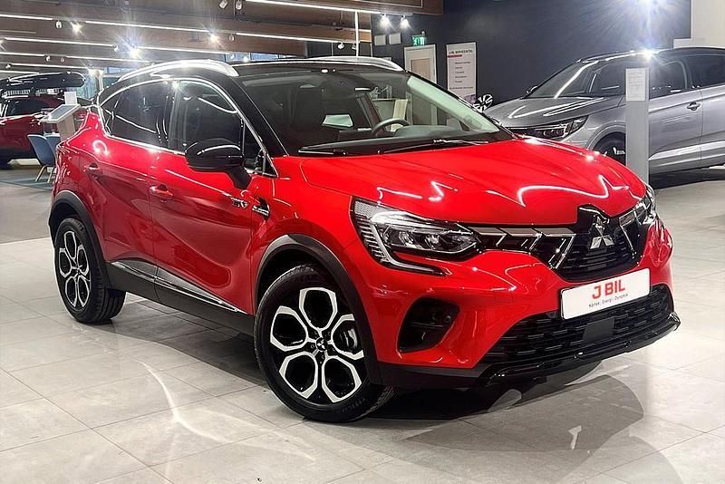 Röd (sunrise red med svart tak) Begagnad 2023 Mitsubishi ASX Intense+ SUV | 389 900 kr - Bild 1/4