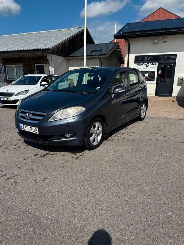 Mörkgrå (grå) Begagnad 2006 Honda FR-V Minibuss | 25 000 kr (Marknadspris) - Bild 1/4