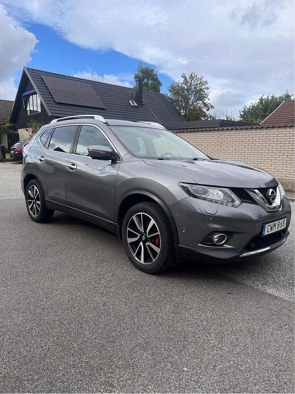 Grå Begagnad 2016 Nissan X-Trail Tekna SUV | 164 900 kr (Marknadspris) - Bild 1/4