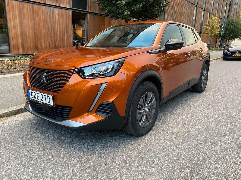 Begagnad Peugeot e-2008 100 kW (136 HK) 2022 Orange SUV