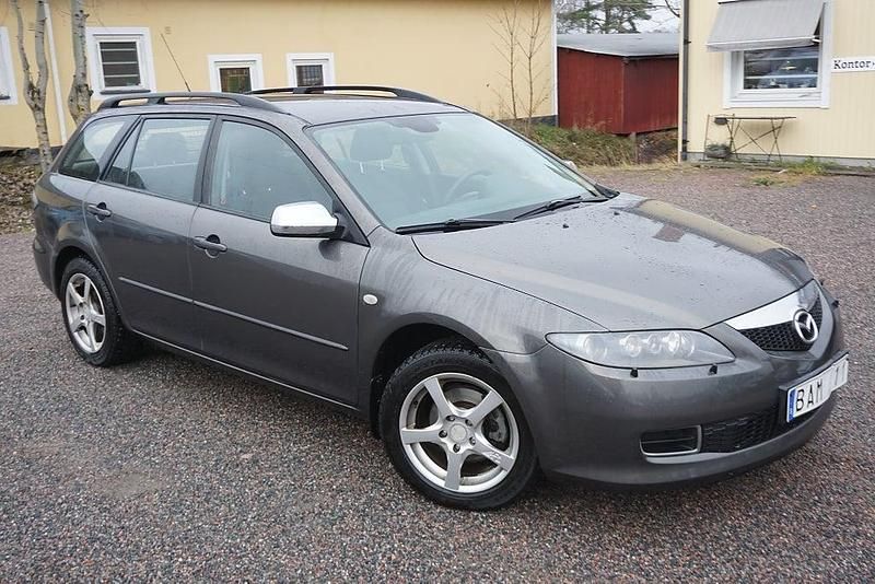 Grå Begagnad 2006 Mazda 6 Touring Kombi | 59 900 kr (Marknadspris) - Bild 1/4