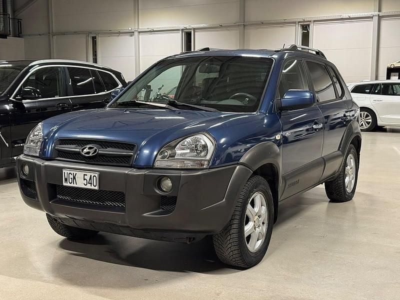 Blå Begagnad 2004 Hyundai Tucson SUV | 49 900 kr (Marknadspris) - Bild 1/4