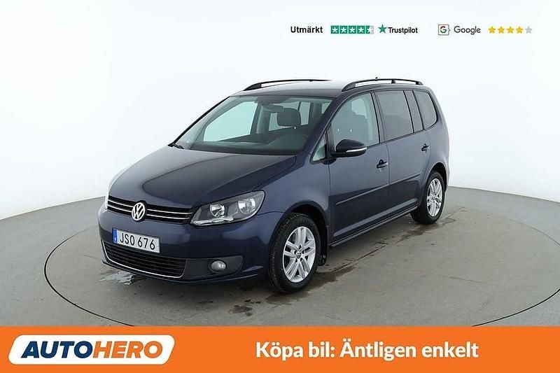 Blå Begagnad 2015 VW Touran Minibuss | 127 000 kr (Marknadspris) - Bild 1/4