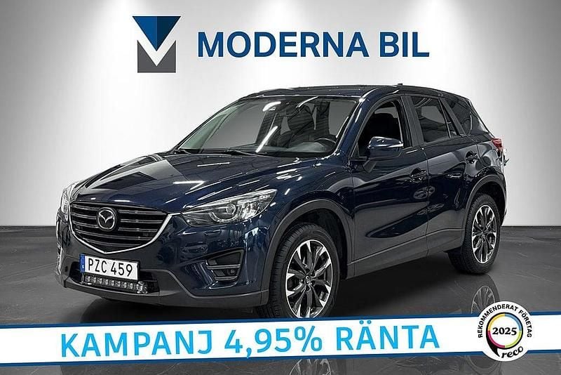 Blå Begagnad 2015 Mazda CX-5 Optimum SUV | 144 900 kr (Marknadspris) - Bild 1/4