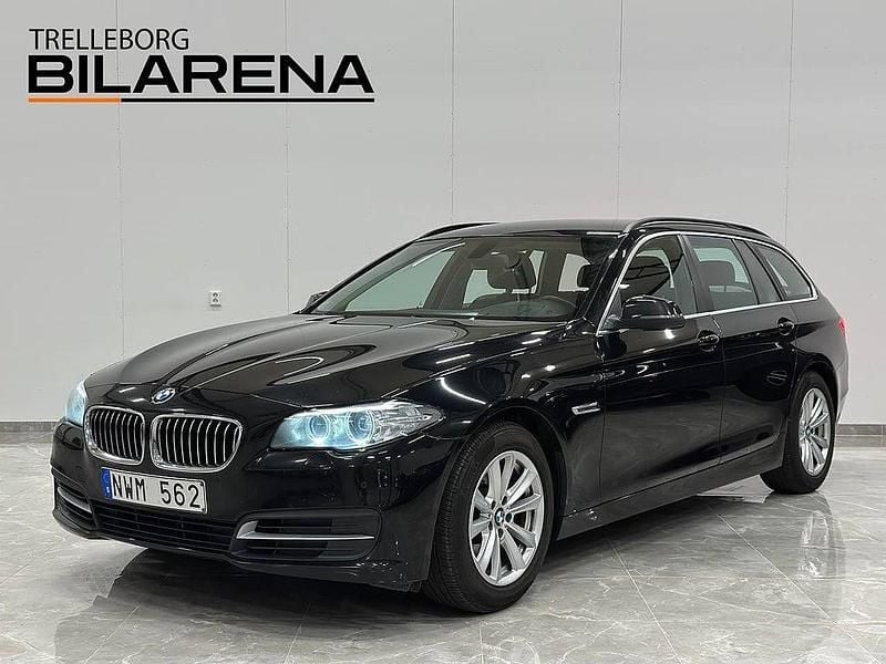 Svart Begagnad 2013 BMW 520 Kombi | 149 900 kr (Marknadspris) - Bild 1/4