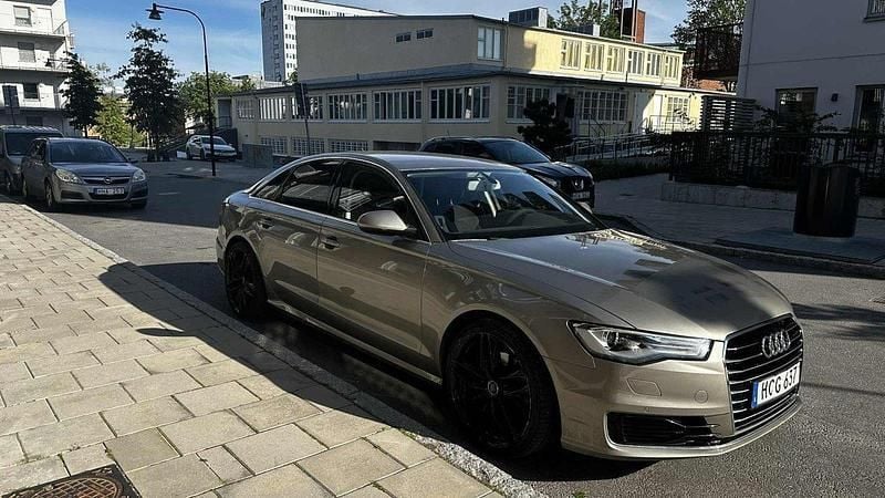 Brun Begagnad 2016 Audi A6 Sport Sedan | 220 000 kr (Marknadspris) - Bild 1/4