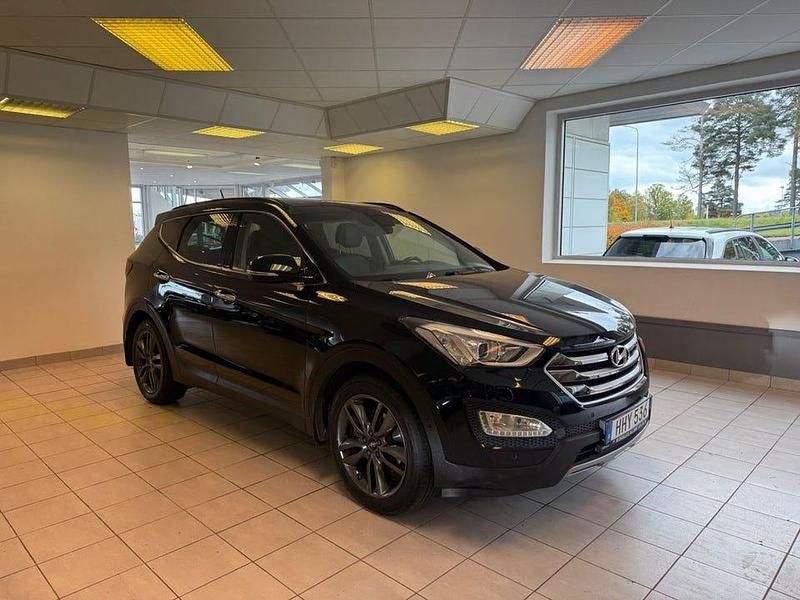 Svart Begagnad 2015 Hyundai Santa Fe Premium SUV | 149 900 kr (Marknadspris) - Bild 1/4