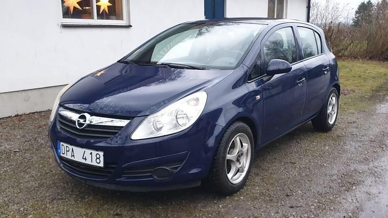 Mörkblå Begagnad 2009 Opel Corsa Halvkombi | 34 900 kr (Marknadspris) - Bild 1/4
