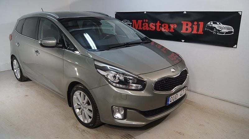 Grå Begagnad 2013 Kia Carens Minibuss | 79 900 kr (Superpris) - Bild 1/4