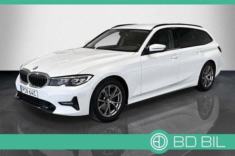 Vit Begagnad 2020 BMW 320 Sport Line Kombi | 293 600 kr (Marknadspris) - Bild 1/4