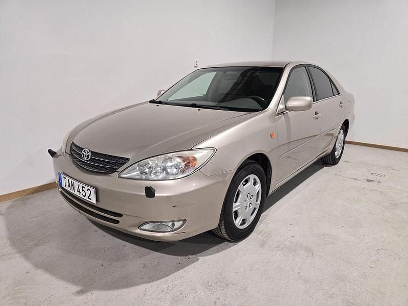 Ljusbrun (brun) Begagnad 2003 Toyota Camry Sedan | 49 500 kr (Marknadspris) - Bild 1/4