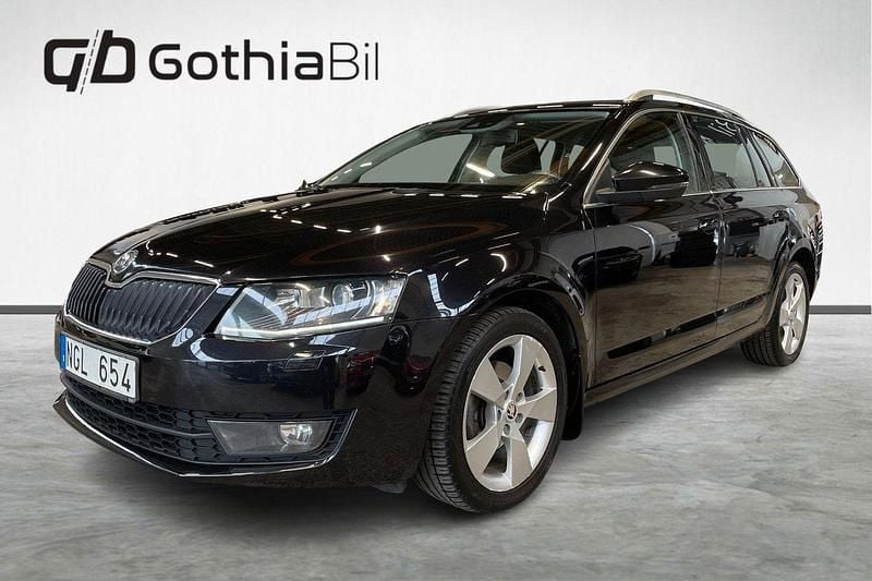 Svart Begagnad 2013 Skoda Octavia Business Line Kombi | 99 900 kr (Marknadspris) - Bild 1/4