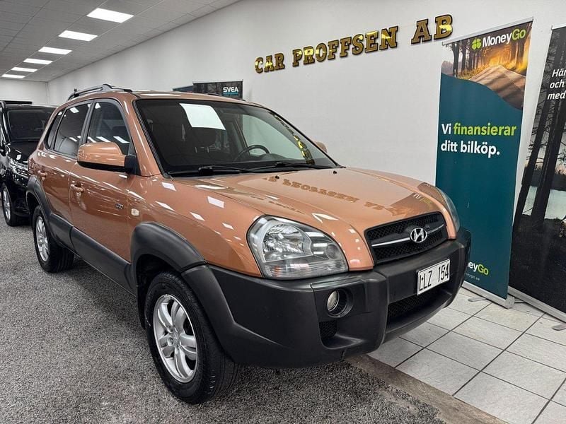 Orange Begagnad 2007 Hyundai Tucson SUV | 34 900 kr (Marknadspris) - Bild 1/4