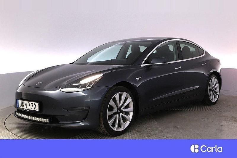 Grå Begagnad 2019 Tesla Model 3 Long Range Sedan | 264 900 kr (Marknadspris) - Bild 1/4