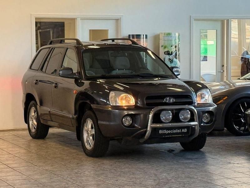 Blå Begagnad 2006 Hyundai Santa Fe SUV | 39 000 kr (Dyr) - Bild 1/4