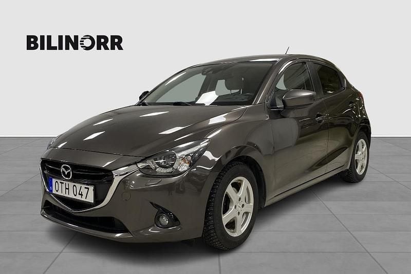 Brun Begagnad 2015 Mazda 2 Active Halvkombi | 114 000 kr (Marknadspris) - Bild 1/4