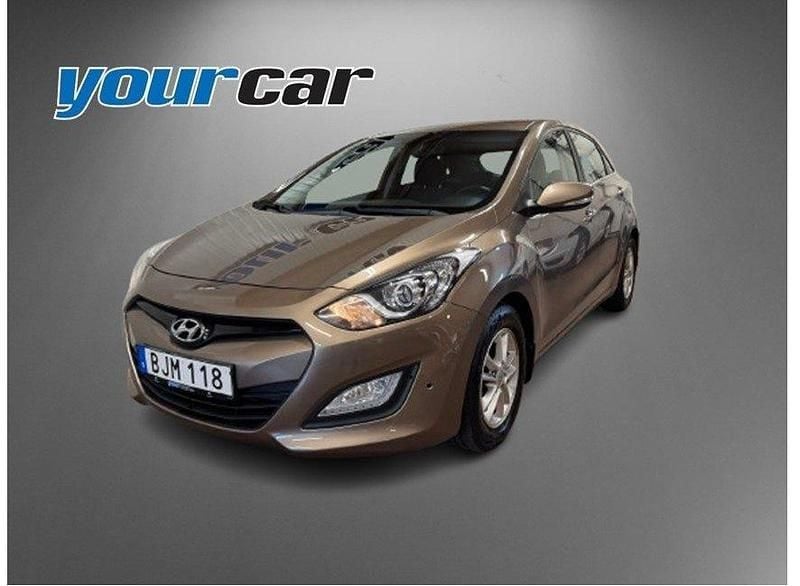 Begagnad Hyundai i30 Premium 128 HK (94 kW) 2014 Brun Halvkombi