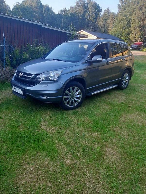 Grå Begagnad 2010 Honda CR-V Executive SUV | 78 000 kr (Marknadspris) - Bild 1/4