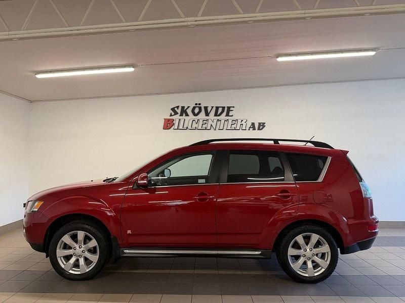 Mörkröd Begagnad 2011 Mitsubishi Outlander SUV | 129 500 kr - Bild 1/4