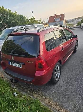 Röd Begagnad 2004 Peugeot 307 Kombi | 32 000 kr (Marknadspris) - Bild 1/4