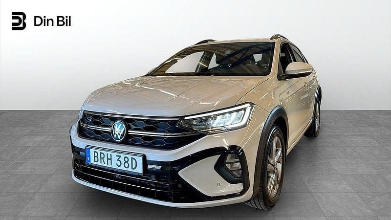 Ljusgrå (ascot grey) Begagnad 2024 VW Taigo R-line SUV | 249 900 kr (Marknadspris) - Bild 1/4
