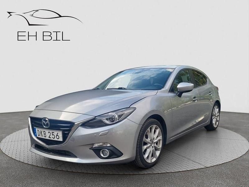 Grå Begagnad 2014 Mazda 3 Inclusive Halvkombi | 129 900 kr (Marknadspris) - Bild 1/4
