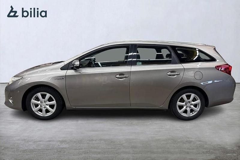 Begagnad Toyota Auris Touring Sports Comfort 137 HK (100 kW) 2013 Brun Kombi