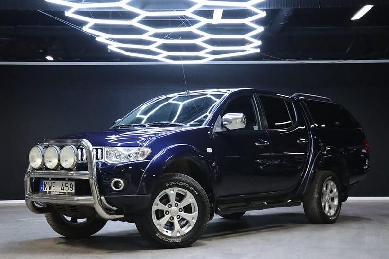 Blå Begagnad 2010 Mitsubishi L200 Pickup | 134 900 kr (Marknadspris) - Bild 1/4