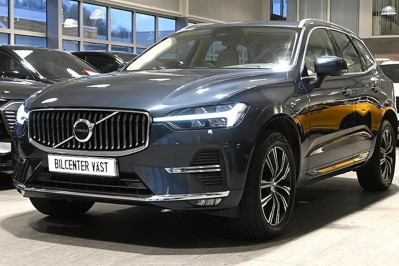 Mörkblå Begagnad 2021 Volvo XC60 Inscription SUV | 419 000 kr (Marknadspris) - Bild 1/4