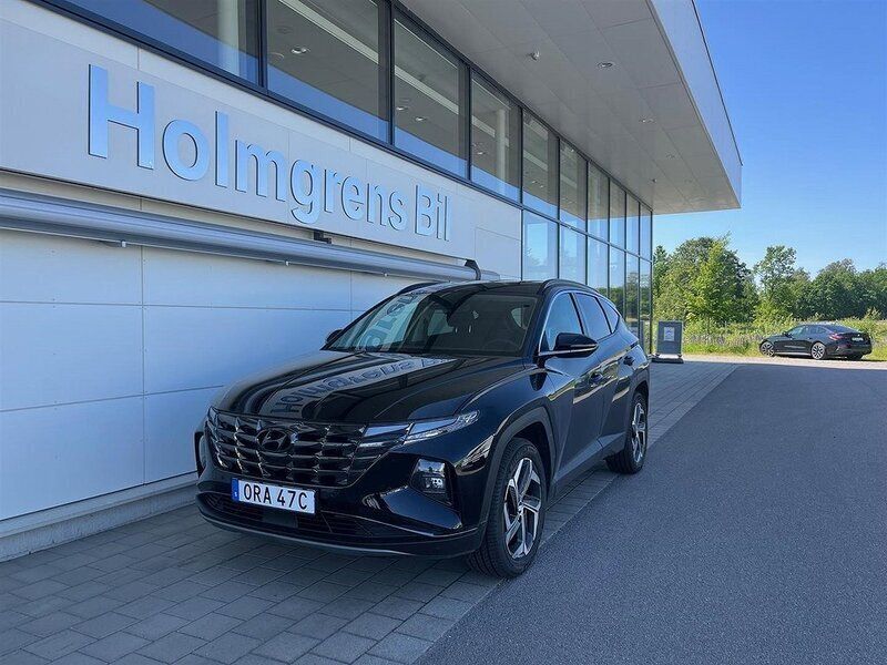 Svart (abyss black pearl) Begagnad 2022 Hyundai Tucson Essential SUV | 394 800 kr (Lite dyr) - Bild 1/4