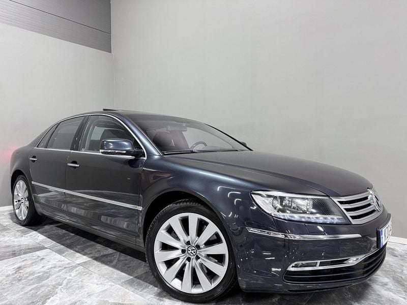 Mörkgrå Begagnad 2010 VW Phaeton SE Sedan | 134 900 kr - Bild 1/4
