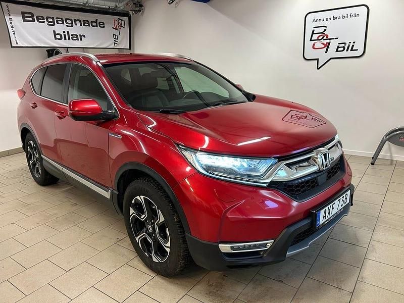 Röd metallic Begagnad 2019 Honda CR-V Hybrid SUV | 269 900 kr (Dyr) - Bild 1/4