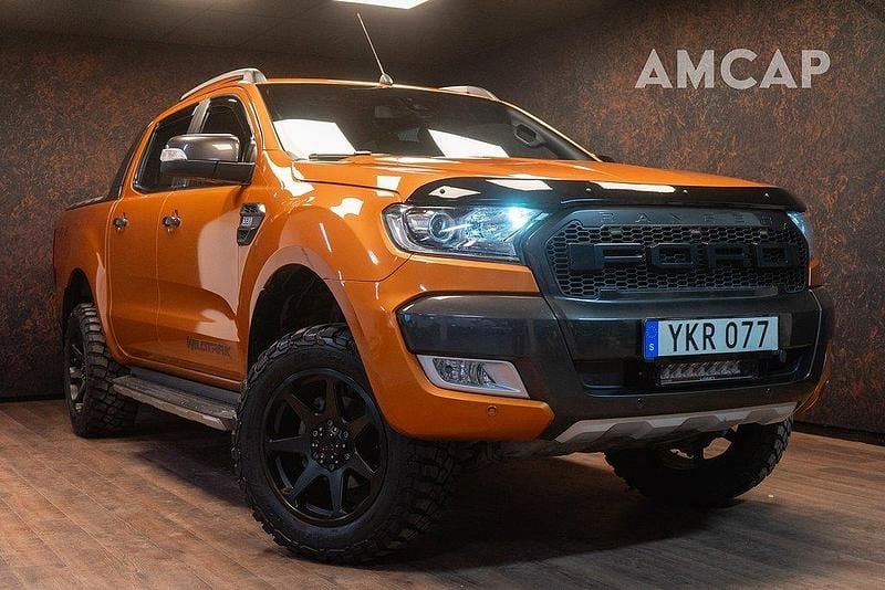 Orange Begagnad 2017 Ford Ranger Wildtrack Pickup | 239 500 kr (Bra pris) - Bild 1/4