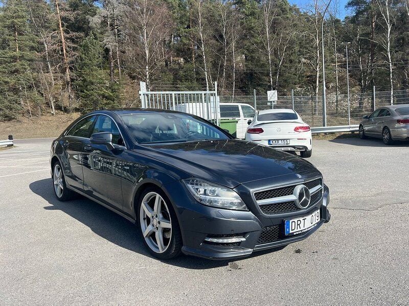 Mörkgrå Begagnad 2011 Mercedes CLS350 AMG Sportkupé | 179 900 kr (Marknadspris) - Bild 1/4
