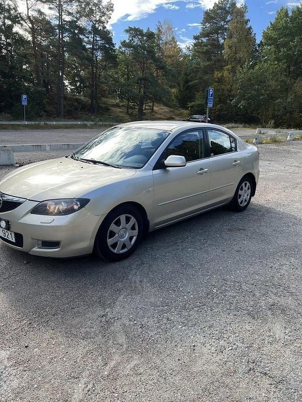 Grå Begagnad 2007 Mazda 3 Touring Sedan | 34 500 kr (Marknadspris) - Bild 1/4