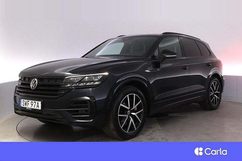 Mörkblå Begagnad 2021 VW Touareg R SUV | 754 900 kr (Lite dyr) - Bild 1/4