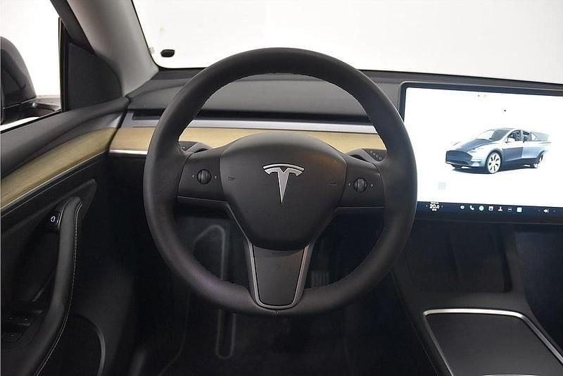 Begagnad Tesla Model Y Long Range AWD 378 kW (514 HK) 2023 Grå SUV