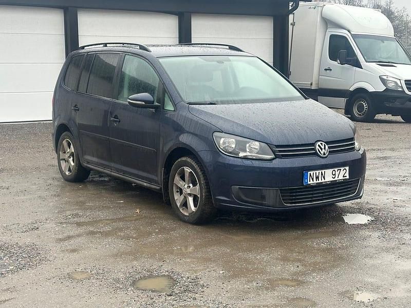Begagnad VW Touran 150 HK (110 kW) 2013 Mörkblå Minibuss