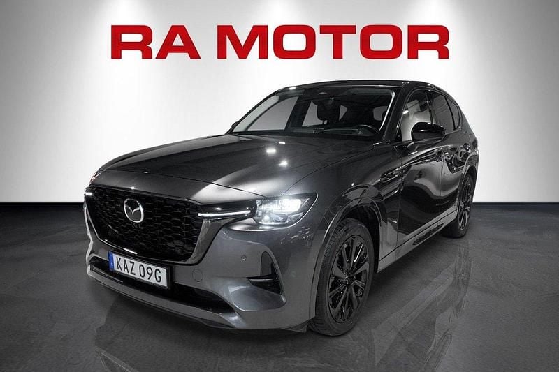 Grå Begagnad 2023 Mazda CX-60 Homura-Line SUV | 469 900 kr (Marknadspris) - Bild 1/4
