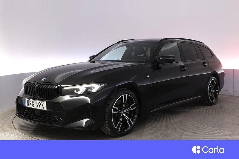 Svart Begagnad 2023 BMW 330e M Sport Kombi | 471 900 kr (Marknadspris) - Bild 1/4