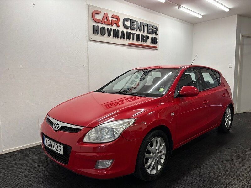 Röd Begagnad 2007 Hyundai i30 Halvkombi | 39 900 kr (Marknadspris) - Bild 1/4